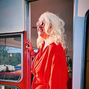 standing outside the caravan studio for photoshoot, NZ, 2024