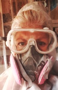 In the jewellery studio wearing protective gear